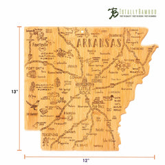 Discover the Totally Bamboo Destination Arkansas Cutting Board, a state-shaped bamboo board with laser-etched illustrations of Arkansas's cities, landmarks, and icons. This delightful cutting surface measures 13 inches by 12 inches.