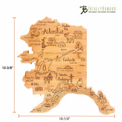 The Destination Alaska Cutting Board by Totally Bamboo is a unique piece featuring laser-engraved artwork of landmarks such as Denali and Anchorage. Measuring 13-3/8" tall and 13-1/2" wide, it is shaped like the state of Alaska.