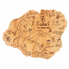 The Totally Bamboo "Destination Kauai" Cutting Board, measuring 9-3/4" x 12-1/2", is a laser-engraved wooden artwork depicting Kaua'i, Hawaii. It features detailed etchings of towns such as Waimea and Hanalei and showcases landmarks and local wildlife, including surfers and the Sleeping Giant.