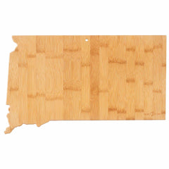 Part of the Destination Series, this bamboo cutting board from Totally Bamboo is shaped like the state of South Dakota. Measuring 9-3/4" by 16" and featuring a small hole for hanging at the top center, its smooth surface beautifully showcases the natural wood grain.