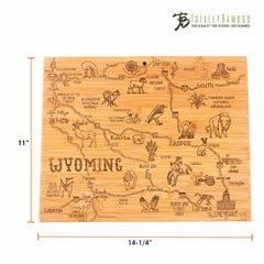 The "Totally Bamboo" Destination Wyoming Cutting Board, measuring 11" x 14-1/4", is crafted from bamboo and features laser-engraved artwork depicting an intricate map of Wyoming. It highlights landmarks, wildlife illustrations, and major towns such as Jackson, Casper, and Cheyenne. This masterpiece is ideal for both kitchen display and use.