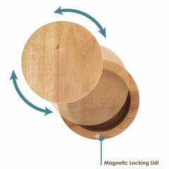 The Rock & Branch® Salt Cellar from Totally Bamboo features a swivel magnetic locking lid, displayed partially open to showcase the interior. Blue arrows point out the rotation direction of the lid with text that reads "Magnetic Locking Lid!