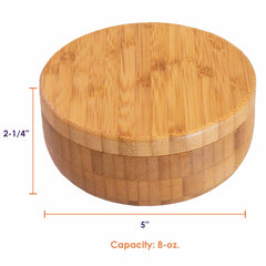 The Salt Keeper Duet from Totally Bamboo is a round wooden salt cellar with a lid, featuring a natural grain pattern. It measures 5 inches in diameter and 2.25 inches in height, with an 8-ounce (1 cup) capacity. Measurements are emphasized in orange text.