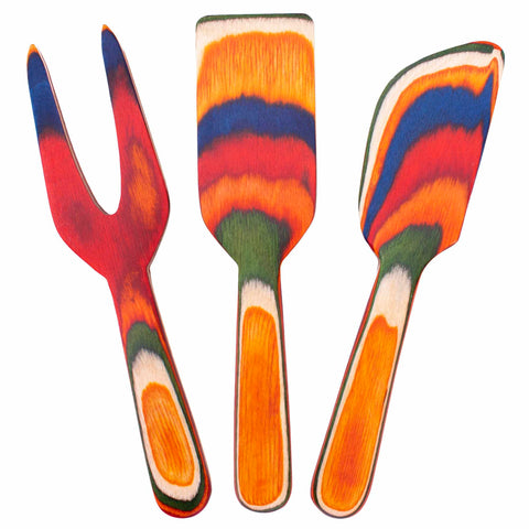 Experience the vibrant charm of the Baltique® Marrakesh Collection 3-Piece Cheese Tool Set by Totally Bamboo. This exquisite set features tools crafted from multi-colored birch wood, each displaying swirling patterns of red, orange, blue, green, and white.