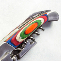 The Baltique® Marrakesh Collection Waiter's Friend Corkscrew by Totally Bamboo is a colorful kitchen essential, boasting an eye-catching handle with vibrant hues of green, red, orange, and blue. Its compact design is complemented by a metallic finish on the corkscrew components, highlighting its functionality and making it a must-have tool for any kitchen.