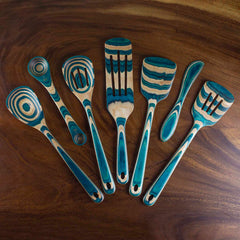 Introducing the Baltique® Mykonos Collection Cooking Spoon by Totally Bamboo: a stunning wooden kitchen utensil featuring a unique teal and natural wood grain pattern. Ideal for non-stick cookware, this 12-1/2 inch cooking spoon offers an artistic and earthy design on a beautifully crafted wooden surface.