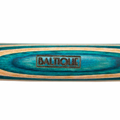 A close-up of the wooden handle from the Baltique® Mykonos Collection 2-in-1 Measuring Spoon by Totally Bamboo reveals beautiful blue and natural wood grain patterns. The word "BALTIQUE" is engraved in the center, highlighting its exquisite craftsmanship with colored birch, reminiscent of a thoughtfully designed measuring spoon.