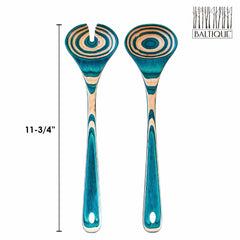 Two wooden utensils from the Totally Bamboo Baltique® Mykonos Collection feature a striped turquoise and natural wood pattern, crafted from colored birch. Each utensil has a long handle with a hole at the end, and one includes a slot. The top right is adorned with a logo depicting tree silhouettes alongside "Baltique." Both utensils measure 11-3/4" in length.