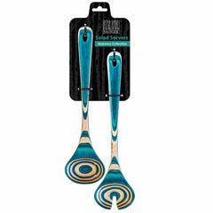 A set of two salad servers from the Totally Bamboo Baltique® Mykonos Collection, showcasing a stunning turquoise and natural birch swirl pattern, is beautifully presented on a black hanger card labeled "Baltique.