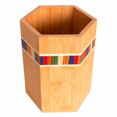 Hexagonal kitchen utensil holder designed from Moso bamboo by Totally Bamboo, showcasing a smooth finish and vibrant horizontal stripes in red, blue, green, and orange around the middle. The interior is empty, with visible wood grain offering a design inspired by the Baltique® Marrakesh Collection.