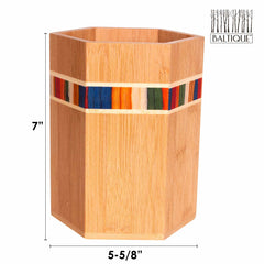 A hexagonal kitchen utensil holder from the Baltique® Marrakesh Collection by Totally Bamboo, made of Moso bamboo and decorated with a vibrant striped accent near the top. It measures 7 inches in height and 5-5/8 inches in width, with the "Baltique® Marrakesh" branding elegantly displayed at the top right.
