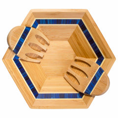 The Totally Bamboo Baltique® Malta Collection Salad Bowl & Salad Hands Set showcases striking blue accents and includes two wooden salad hands with finger-like slots. The vibrant blue details on both the bamboo bowl and the salad hands enhance their decorative appeal.