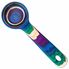 The Baltique® Mumbai Collection by Totally Bamboo introduces a vibrant coffee scoop that showcases swirling patterns in blue, green, purple, and natural wood hues. Made from colored birch, the handle includes a handy hole near the end for simple storage.