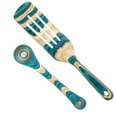 Introducing the Totally Bamboo Baltique® Mykonos Collection 2-Piece Utensil Set: A wooden kitchen utensil set that includes a slotted spatula and a round spoon. Featuring a unique teal, blue, and natural wood grain pattern, each piece is designed with holes at the end for easy hanging.