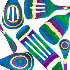 Introducing the colorful Baltique® Mumbai Collection 7-Piece Cooking Utensil Set by Totally Bamboo, crafted from vibrant colored birch. This striking collection features spatulas, spoons, and slotted spoons adorned with dynamic stripes of blue, green, purple, and yellow to bring an artistic touch to your kitchen.