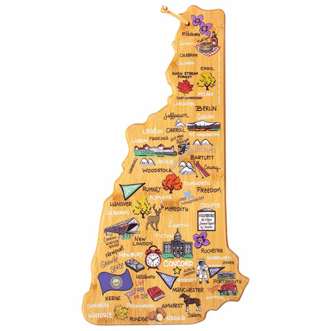 The New Hampshire Cutting Board with Artwork by Fish Kiss™, from Totally Bamboo, showcases an illustrated wooden map of New Hampshire adorned with vibrant drawings of landmarks, including mountains, a lighthouse, and a clock that highlight cities such as Concord, Portsmouth, and Manchester.