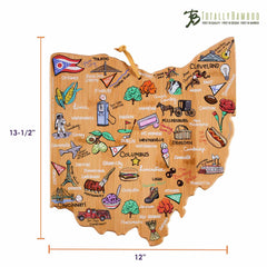 The Ohio Cutting Board with Artwork by Fish Kiss™ from Totally Bamboo is crafted in the shape of the state and decorated with lively illustrations highlighting landmarks and foods from Columbus, Cleveland, and Cincinnati, along with symbols like a buckeye and a football.