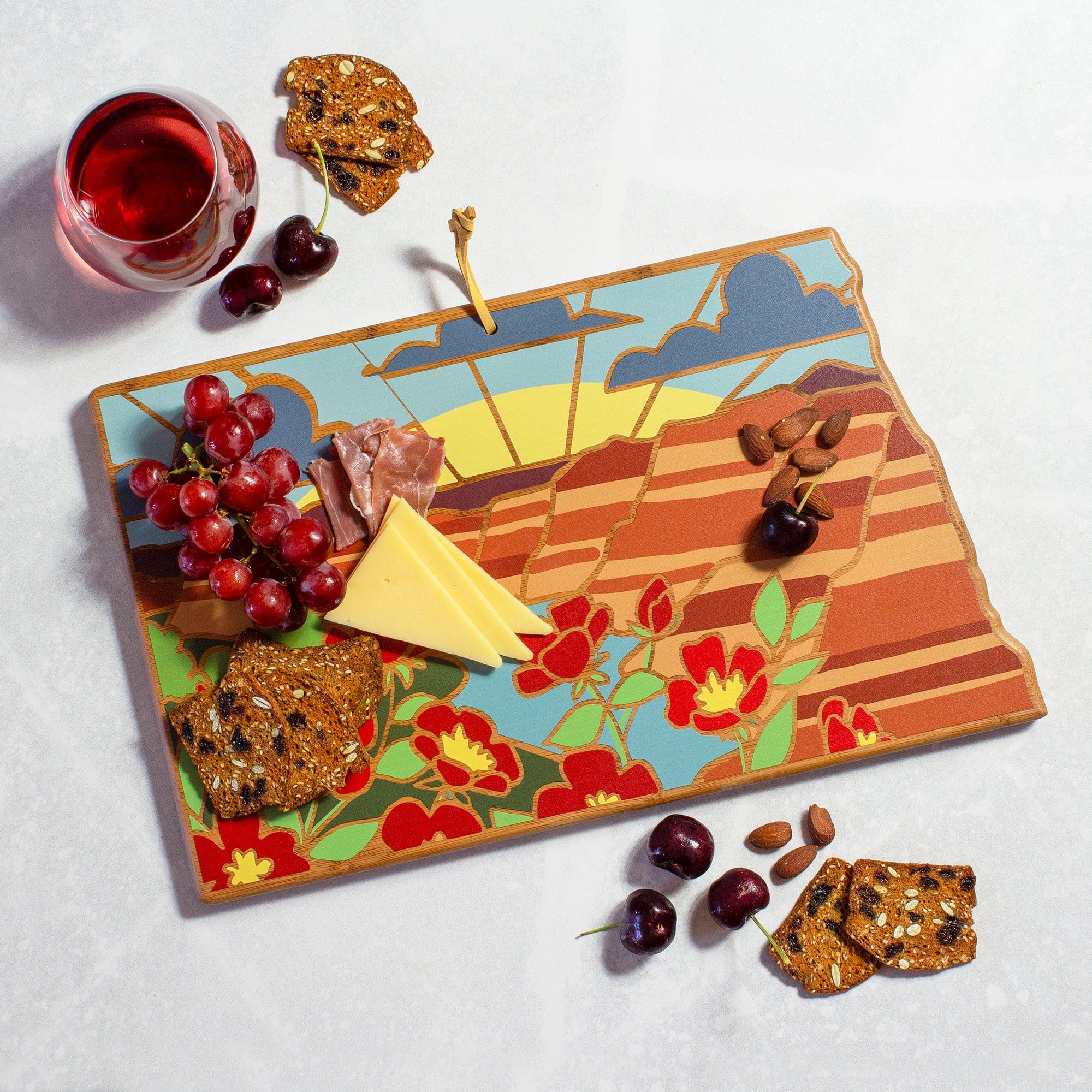 Totally Bamboo North Dakota State Shaped Serving and Cutting Board with Artwork by Summer Stokes