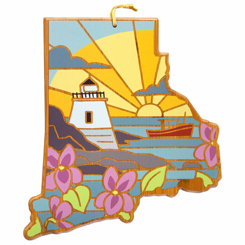 A lively Summer Stokes artwork graces this Rhode Island-shaped cutting board, showcasing a vibrant sunset over the ocean with a lighthouse and boat. Pink flowers embellish the foreground, bringing a touch of nature to this stunning creation by Totally Bamboo.