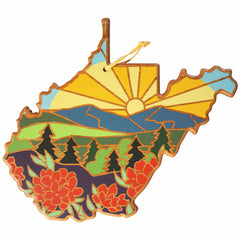 This vibrant wooden piece from Totally Bamboo, designed by Summer Stokes, is shaped like West Virginia and features a beautiful illustration of a sunrise over mountains, with evergreen trees and red flowers. It comes with a yellow ribbon for easy hanging.